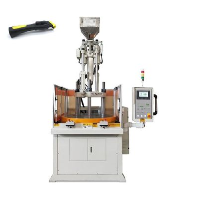 Macchina di stampaggio a iniezione di plastica rotativa verticale ad alta efficienza per la realizzazione di maniglie