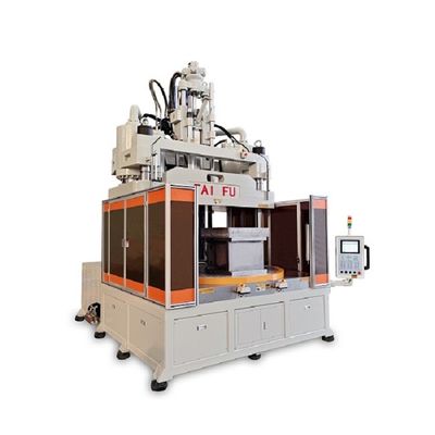 Macchina per stampaggio a iniezione verticale da 200 tonnellate per la fabbricazione di un supporto per fusibili con tavolo di lavoro basso