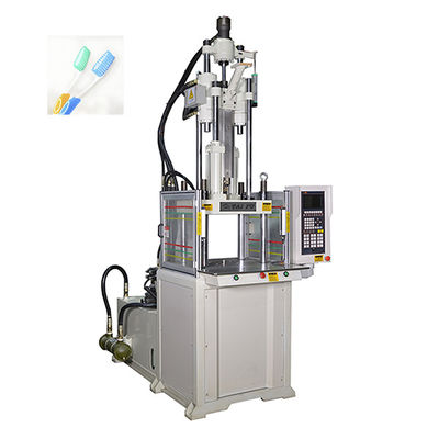 Macchina di stampaggio a iniezione verticale standard di alta qualità per la fabbricazione di spazzolini da denti