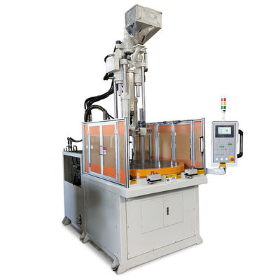 Macchina di stampaggio a iniezione di plastica rotativa verticale ad alta efficienza per la fabbricazione di parti auto